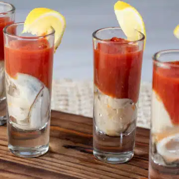 Wide image of oyster shooters.
