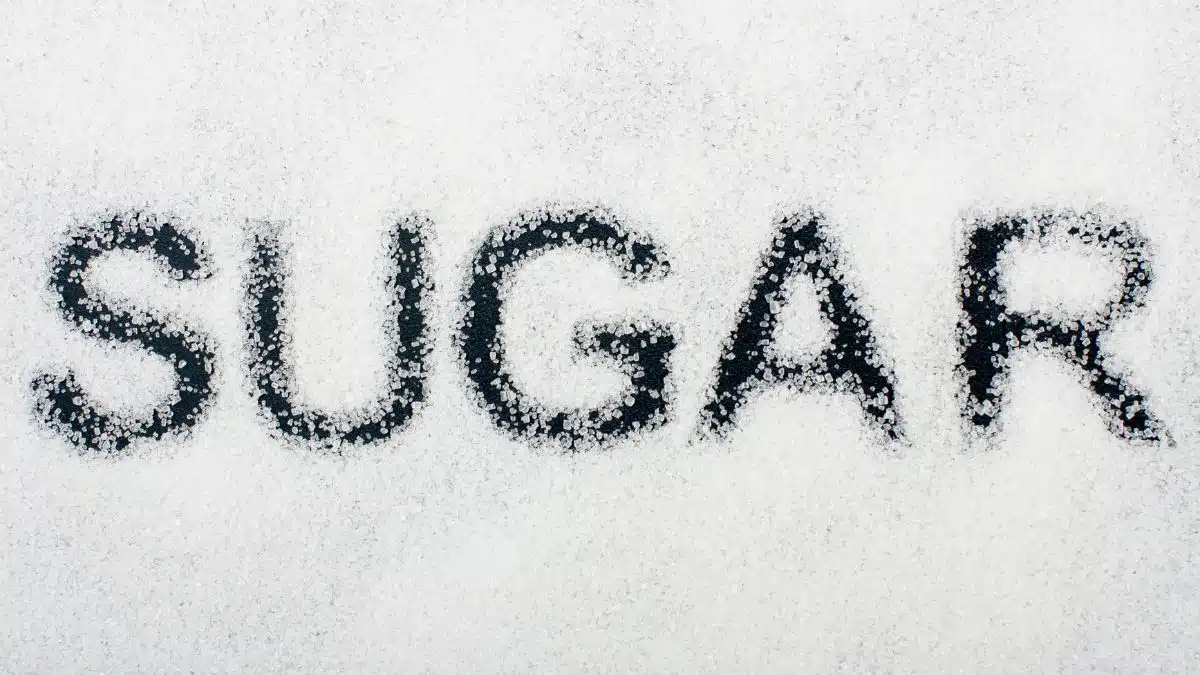 Wide image of sugar spelled out in sugar.