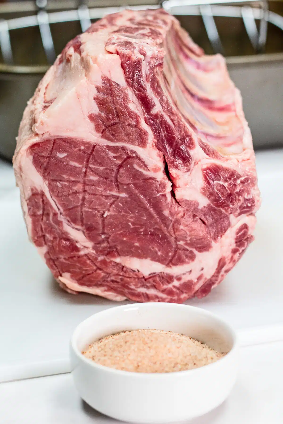 No peek (or oven off method) prime rib roast ingredients featuring a standing rib roast and prime rib rub.