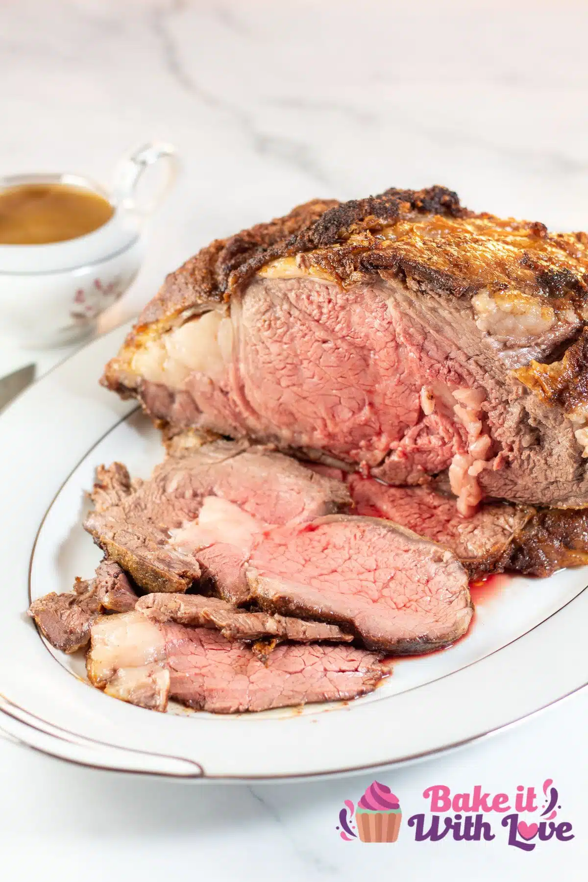 Tall image showing sliced air fryer prime rib.