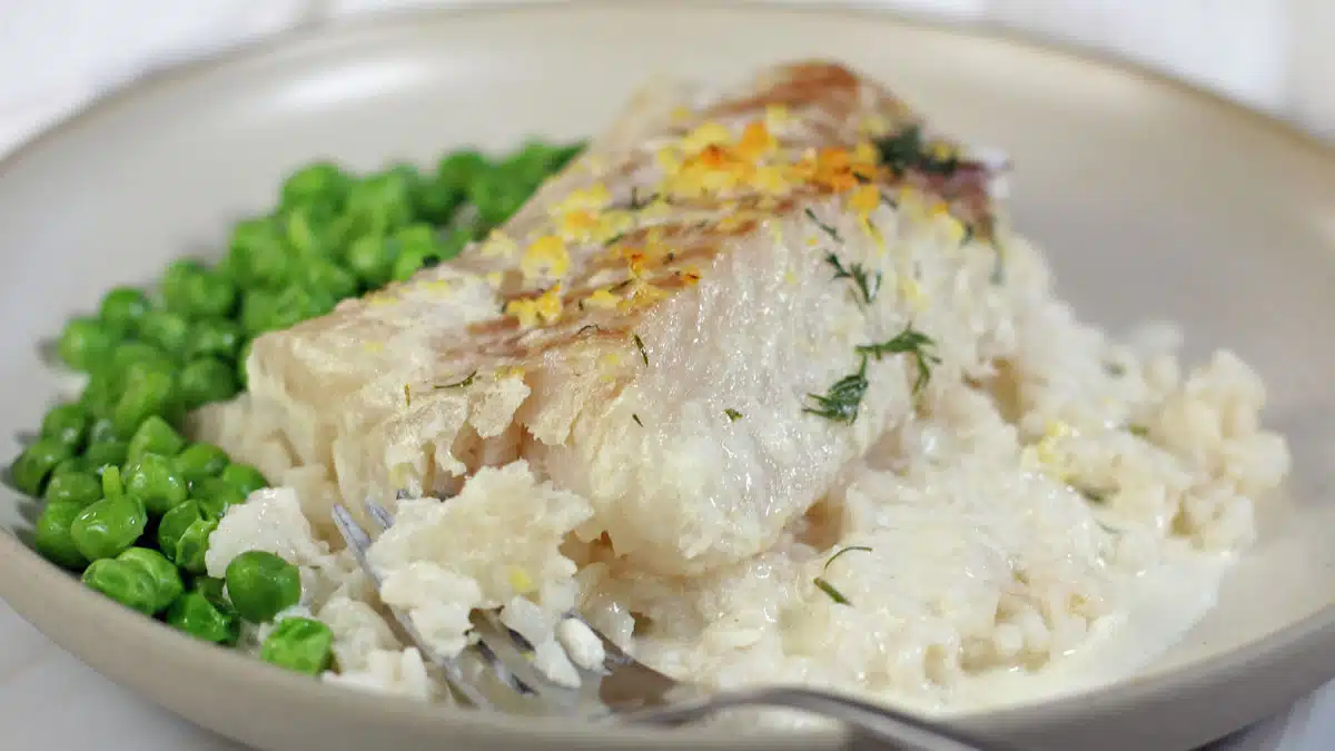 Wide image of butter baked cod fish.