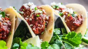 Amazingly tasty albondigas tacos topped with cojita cheese and fresh chopped cilantro.