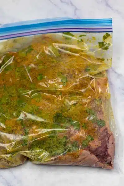 Process image 3 showing the zip lock bag with marinade and steak.