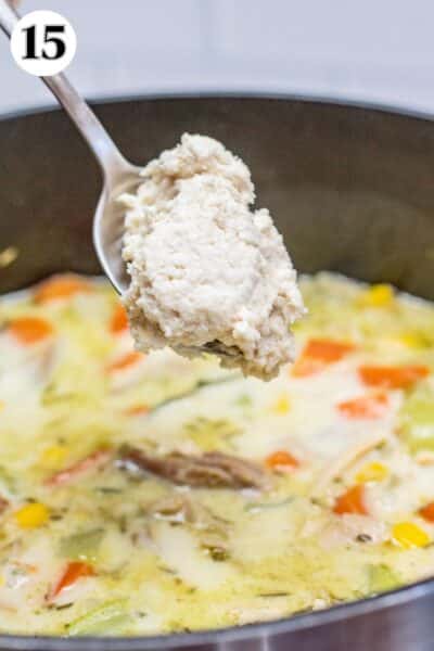 Turkey and dumplings soup process photo 15 portion out the dumpling dough into the soup.