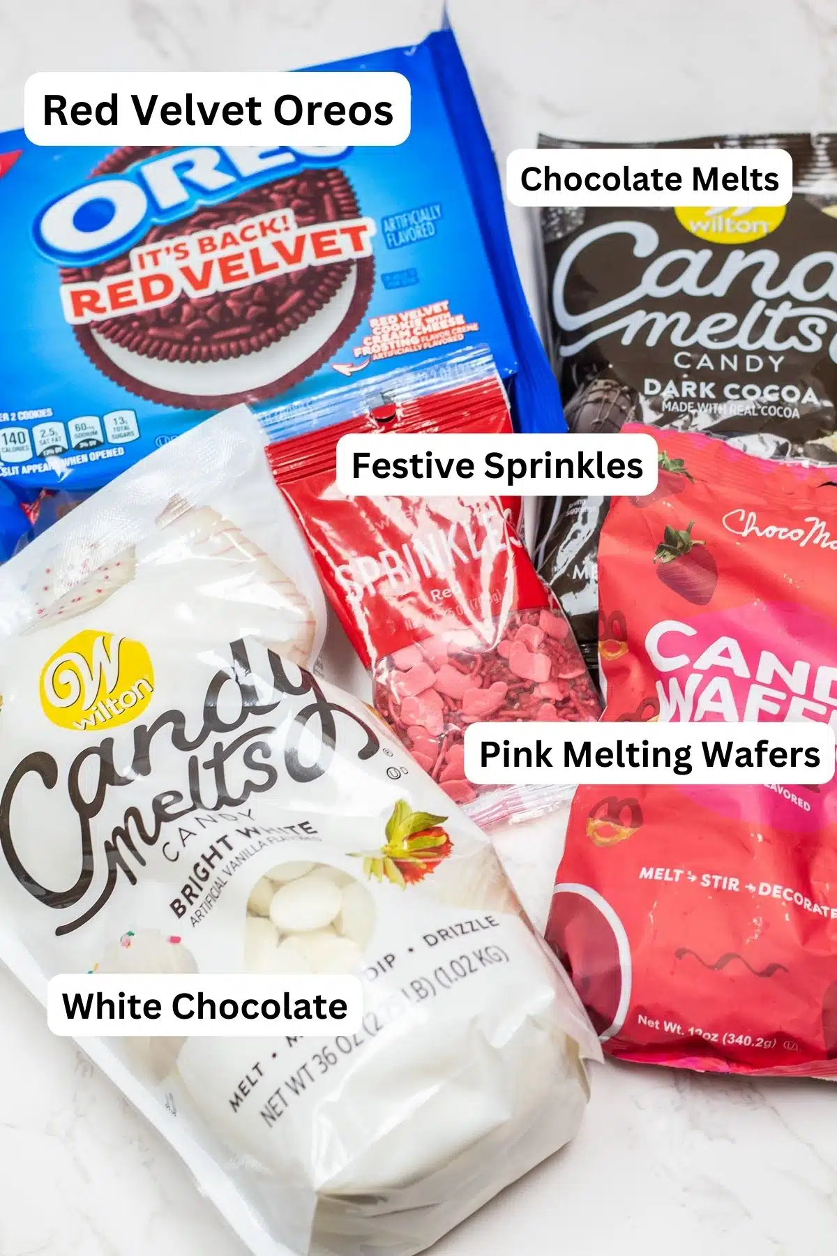 Valentine's Day Oreo chocolate bark candy making ingredients with labels.