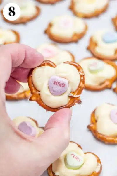Valentine's Day pretzel hearts process photo 8 pop them hearts off the parchment paper and store or share.