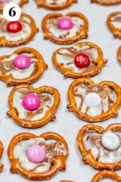 Valentine's Day pretzel hugs candies process photo 6 repeat with all the pretzels then allow to set.