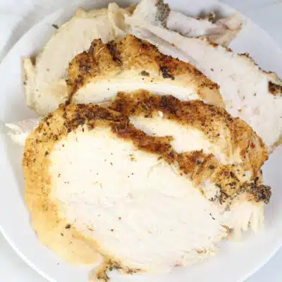 Square image of instant pot turkey breast, sliced.