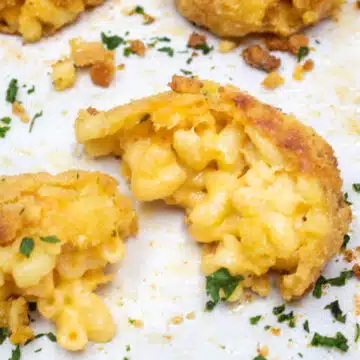 Wide image of breaded mac & cheese bites.