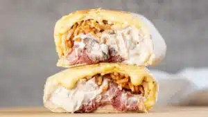 Wide stacked image of prime rib quesaritos.