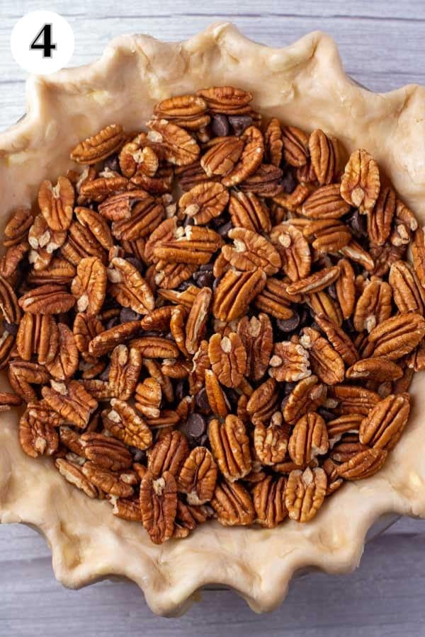 Cracker Barrel chocolate pecan pie copycat recipe process photo 4 fill the pie with pecans and chocolate chips.