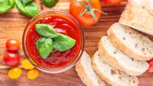 Pomodoro sauce in a small dish for dipping sliced bread.