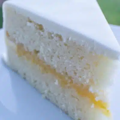 Pin image with text of homemade white cake.