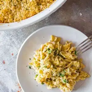 Square image of tuna noodle casserole with panko topping.