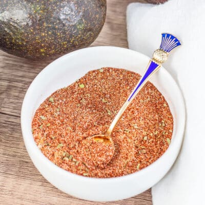 Flavorful guacamole seasoning is best when homemade like this easy DIY spice blend in white bowl.