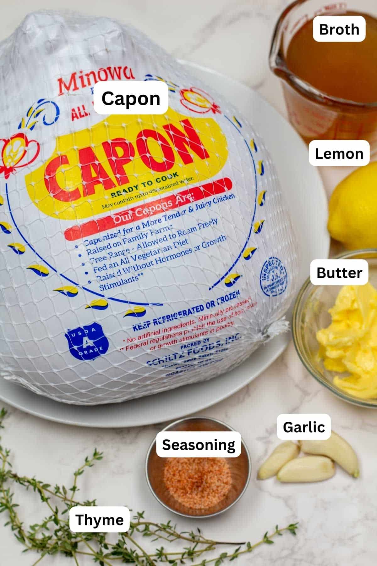 Roast Capon chicken ingredients for recipe with labels.