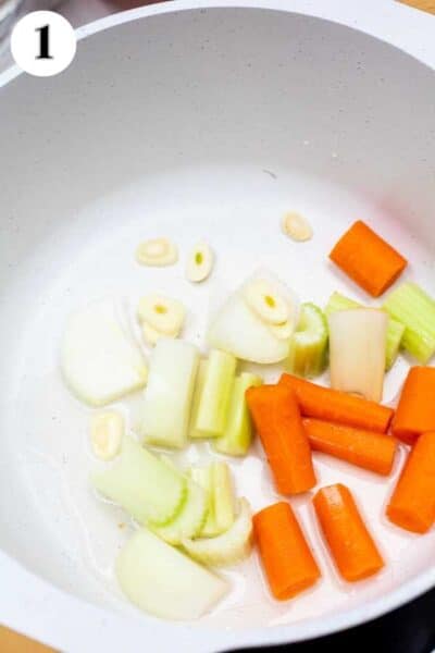 Process image 1 showing sauteing the vegetables.