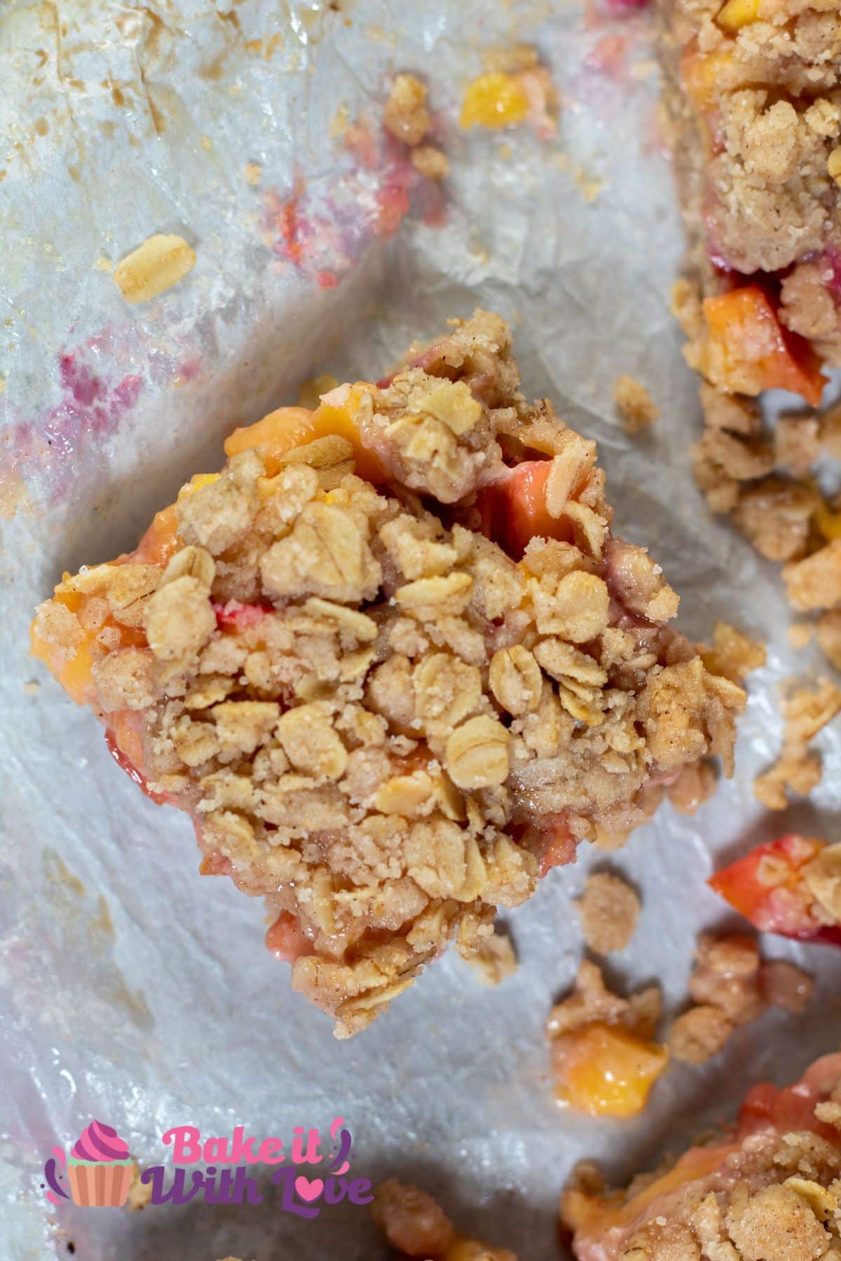 Tall overhead image showing a single nectarine crumble bar.