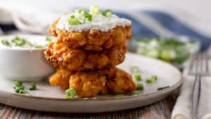 Wide image showing Southern corn fritters.