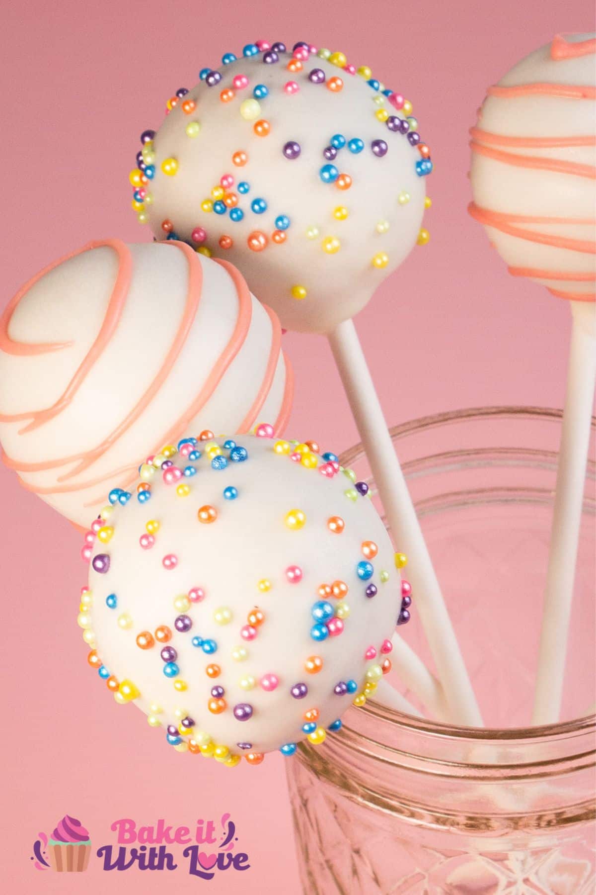 Tasty homemade white cake pops set in a glass jar.