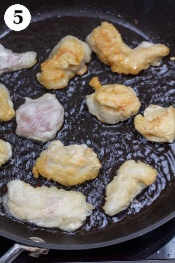 Process image 5 frying the battered chicken.