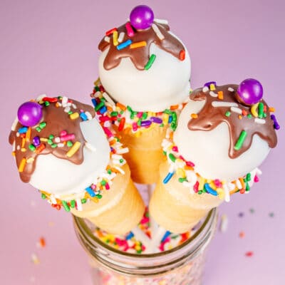 Cute and easy homemade ice cream cone cake pops are a fun treat to make like this trio in a jar.