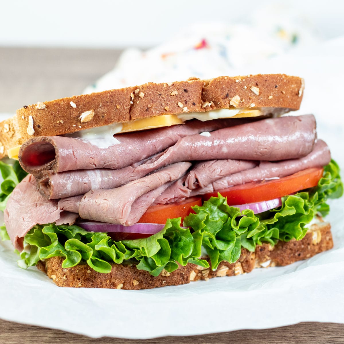 Square image of a classic roast beef sandwich.