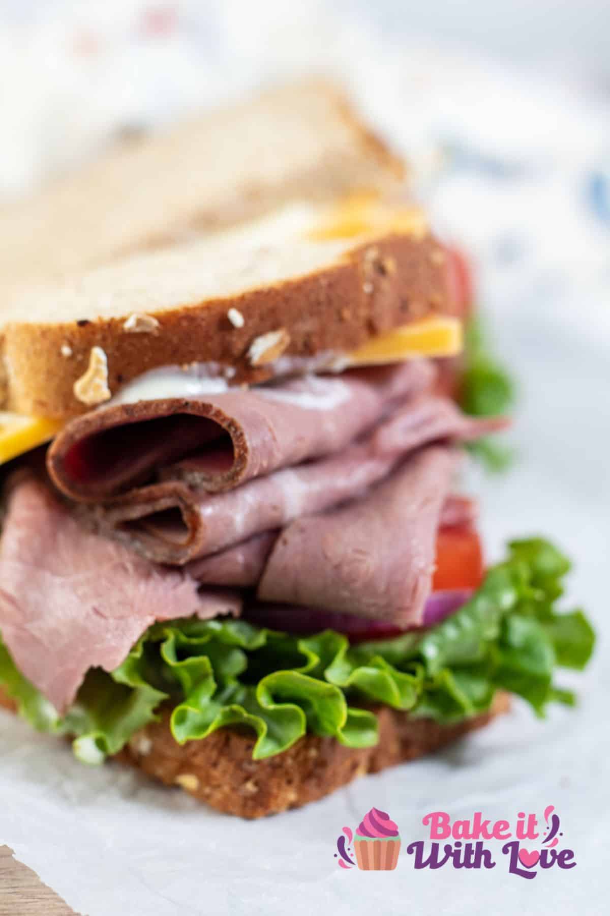 Tall image of a classic roast beef sandwich.
