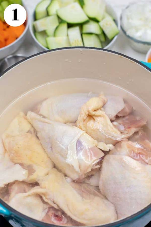 Mexican chicken soup caldo de pollo process photo 1 add chicken and water plus salt.