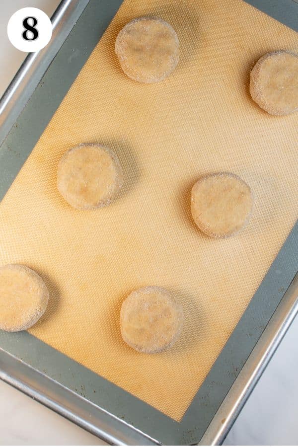 CRUMBL churro cookies process photo 8 place dough onto baking sheet and press to flatten slightly.