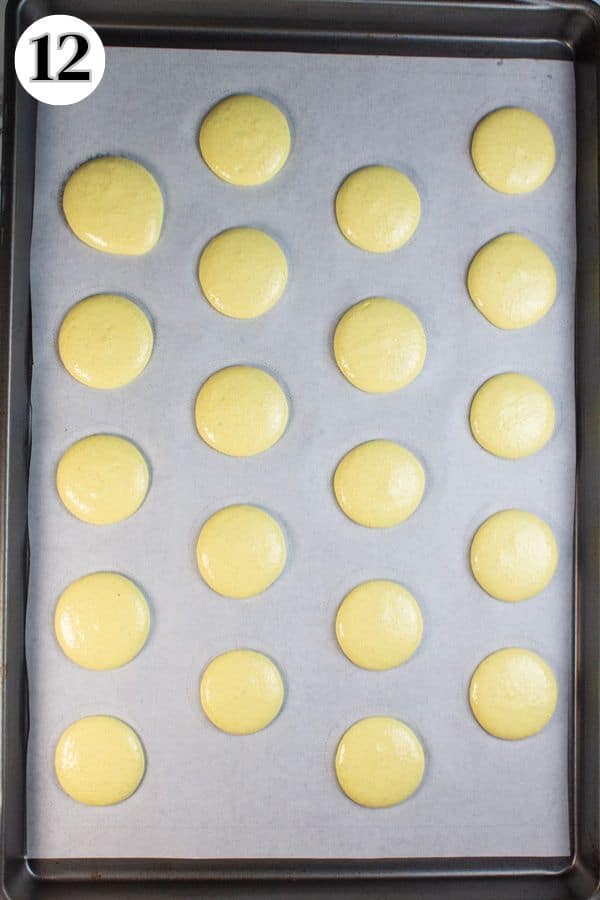 Lemon macarons process photo 12 pipe the meringue shells onto your prepared baking sheet.