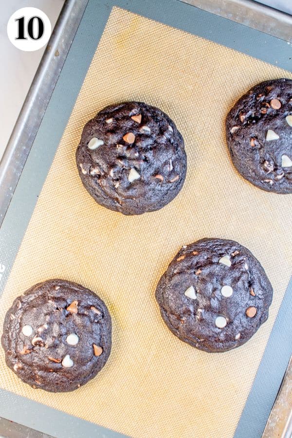 Levain bakery black and white chocolate chip cookies copycat process photo 10 baked cookies on the baking sheet.