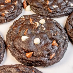 Levain Bakery black and white chocolate chip cookies are rich, delicious and shown here on a white background.