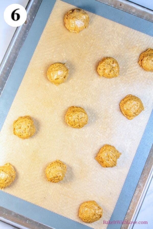 Pumpkin whoopie pies process photo 6 portioned dough on the baking sheet.