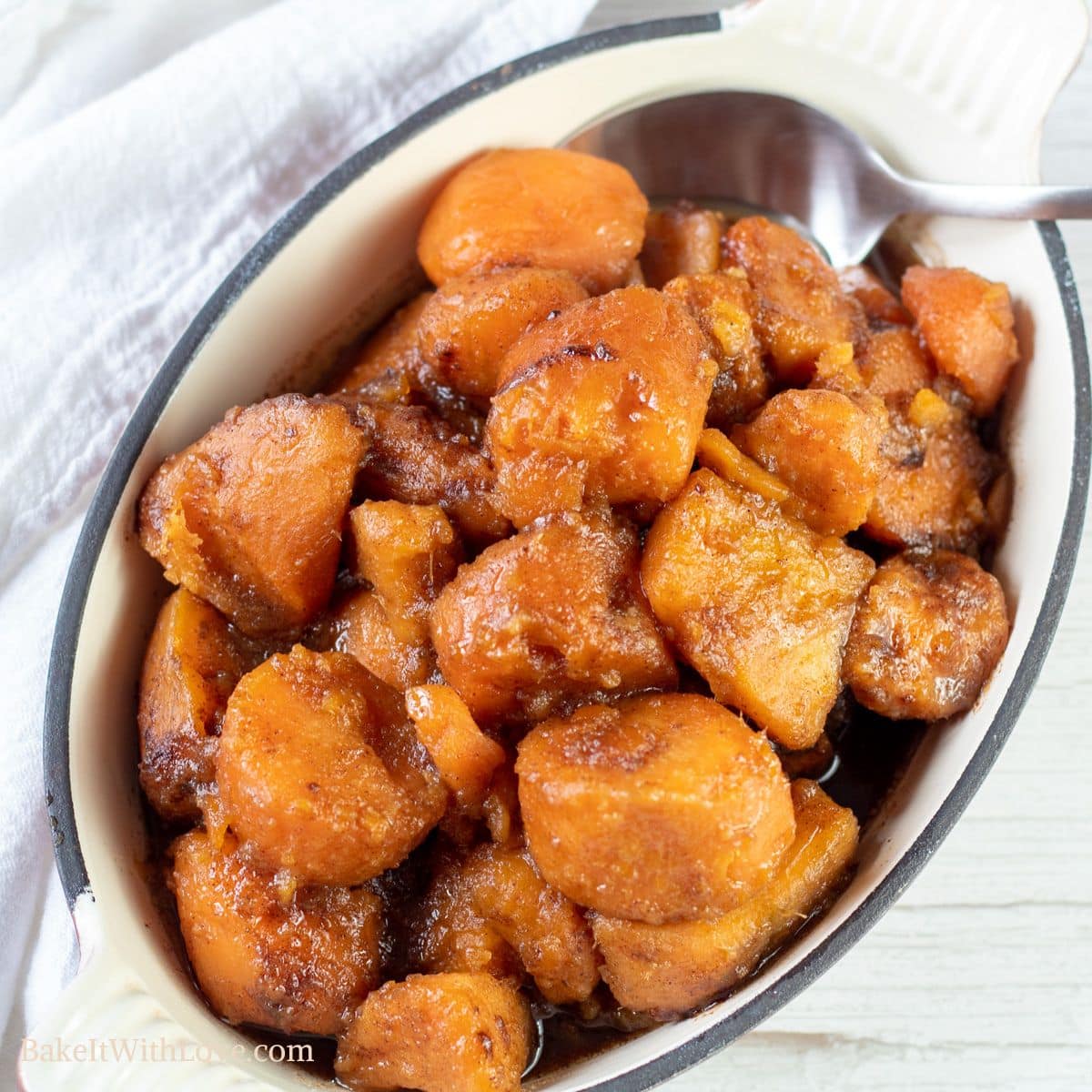 Square image of slow cooker candied yams.