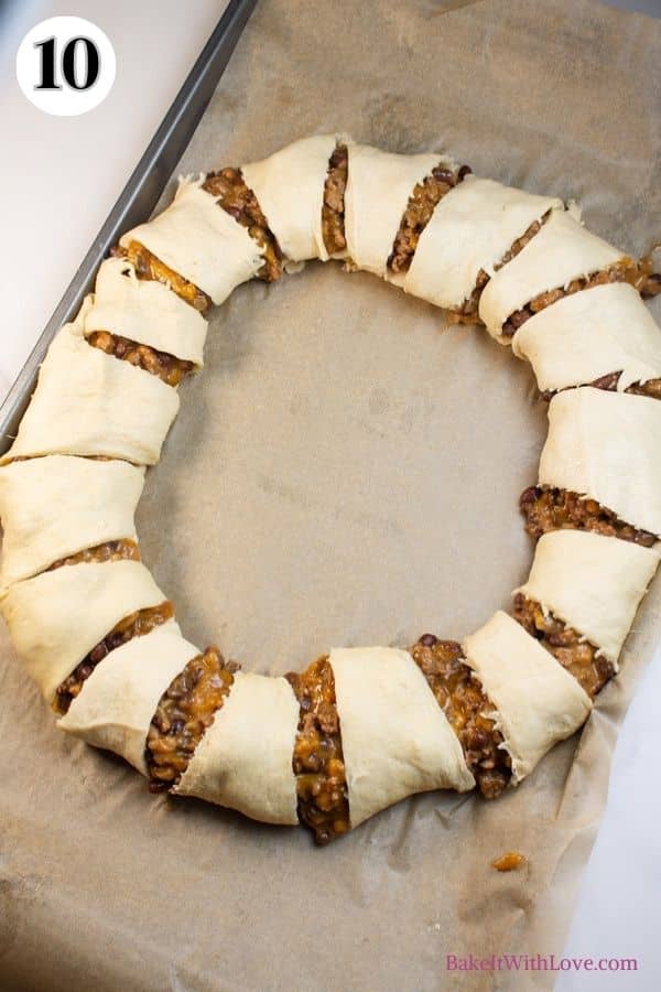 Spider taco ring process photo 10 assembled taco ring on a baking sheet.