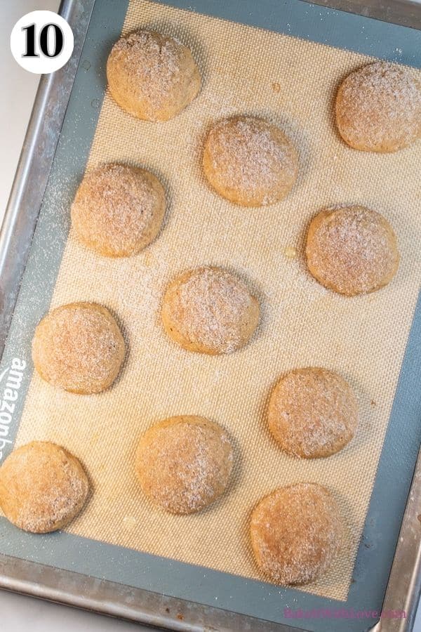 Apple cider whoopie pies process photo 10 showing the whoopie pie cakes topped with cinnamon sugar.