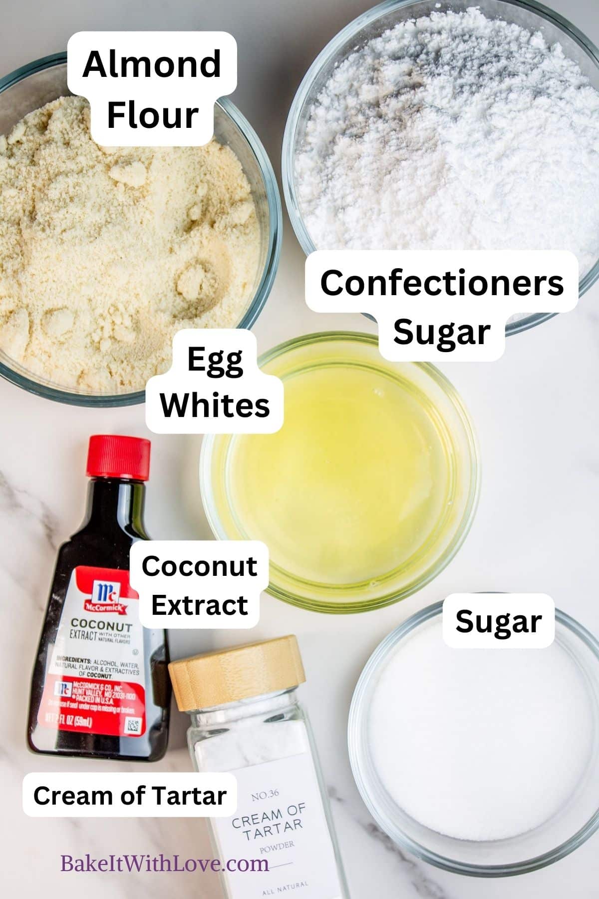 Ingredients for toasted coconut macaron shells that have been measured out and labeled.