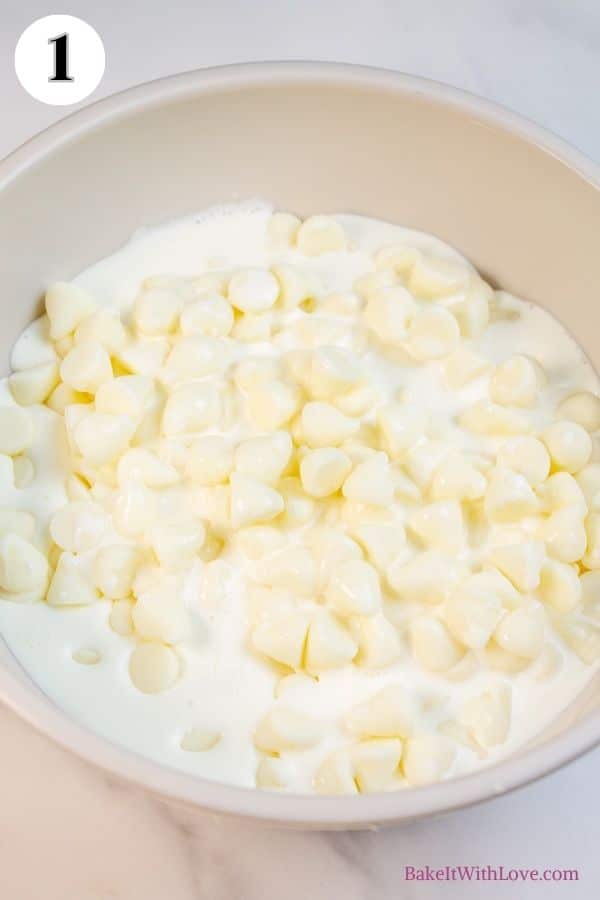 Toasted coconut macarons process photo 1 showing heavy cream and white chocolate chips in a mixing bowl.