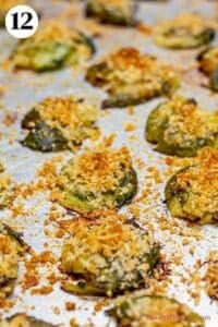 Crispy parmesan smashed brussel sprouts process photo 12 showing the finished, baked brussel sprouts on a baking sheet.