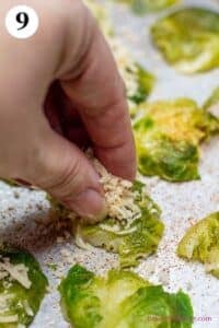 Crispy parmesan smashed brussel sprouts process photo 9 showing a hand placing the topping mixture onto each brussel sprout.