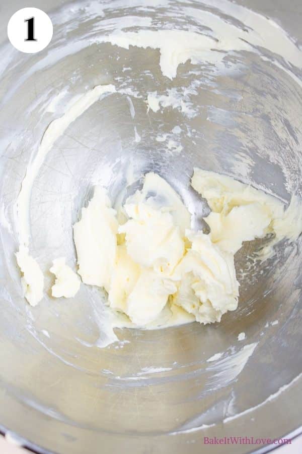 Grinch cookies process photo 1 showing creamed butter in a metal mixing bowl. 