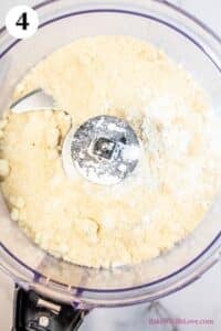 Mint chocolate macarons process photo 4 showing confectioners sugar and almond flour in the bowl of a food processor.