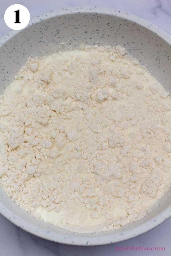 Process image 1 showing Bisquick mix in a bowl.