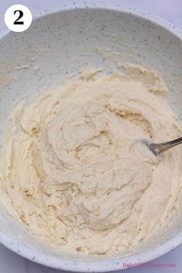 Process image 2 showing Bisquick mix combined with milk in a bowl.