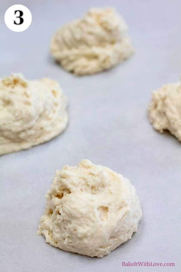 Process image 3 showing biscuit dough portioned on baking sheet.