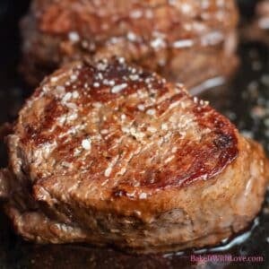 Square image of pan seared filet mignon.