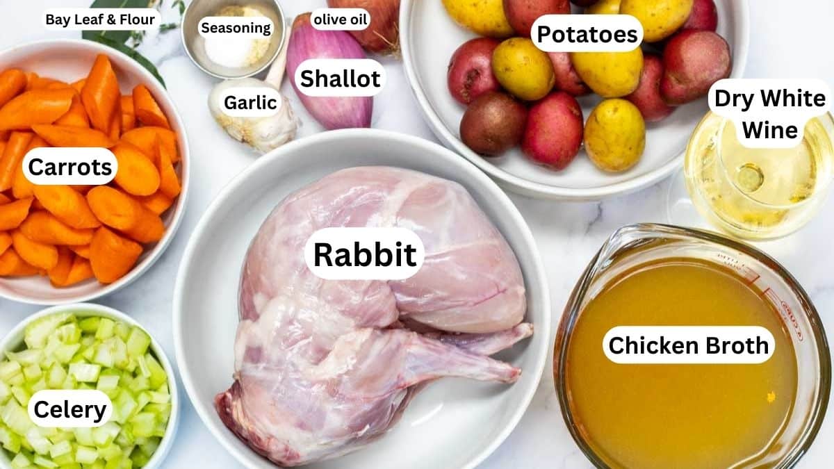 Wide image showing all the ingredients with labels to make rabbit stew.