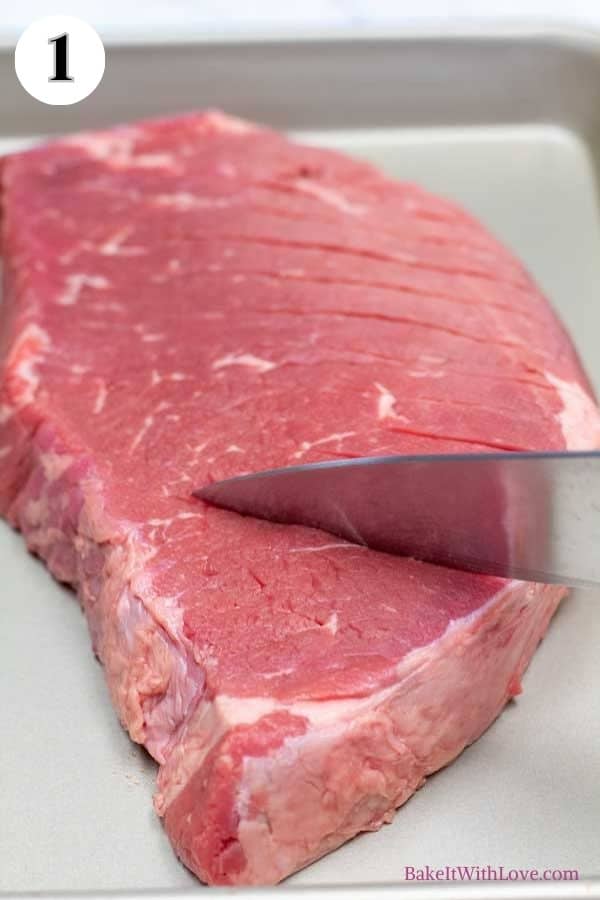 Process image 1 showing scoring the corned beef with a knife.