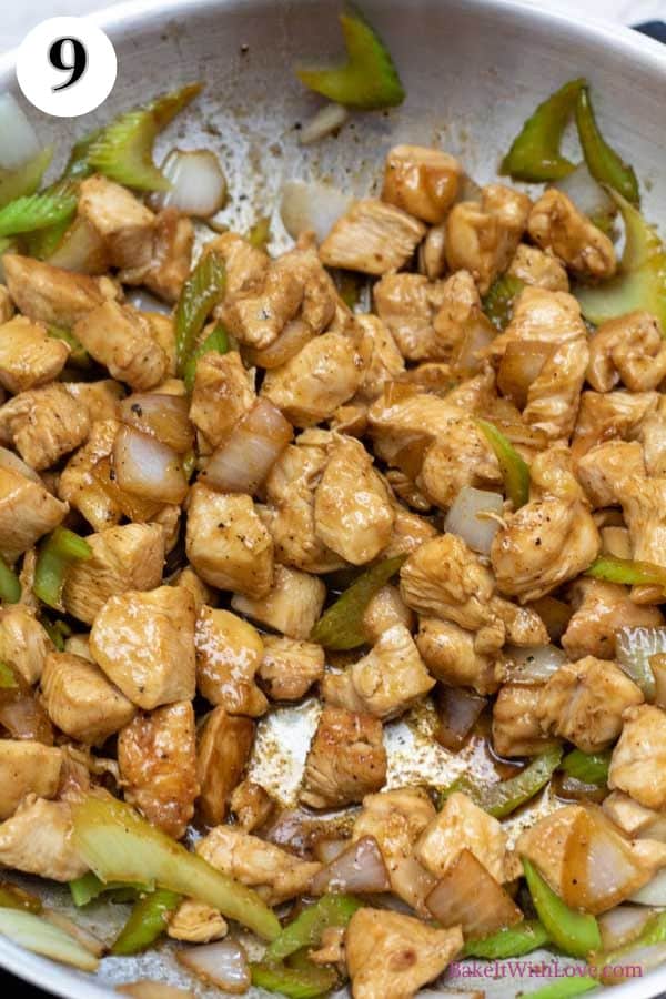 Panda Express black pepper chicken copycat recipe process photo 9 tossing the cooked chicken with seasoned veggies before serving.